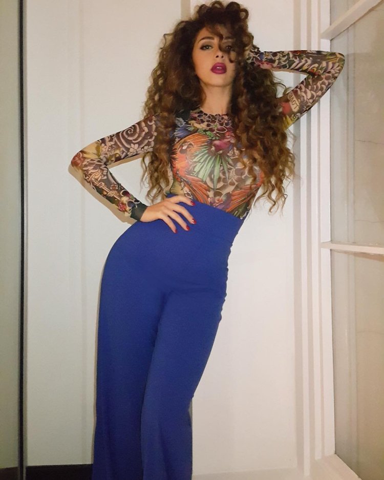 Miriam Fares in a swimsuit