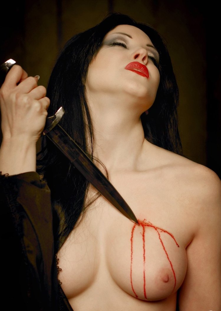 Naked photo shoot with a knife