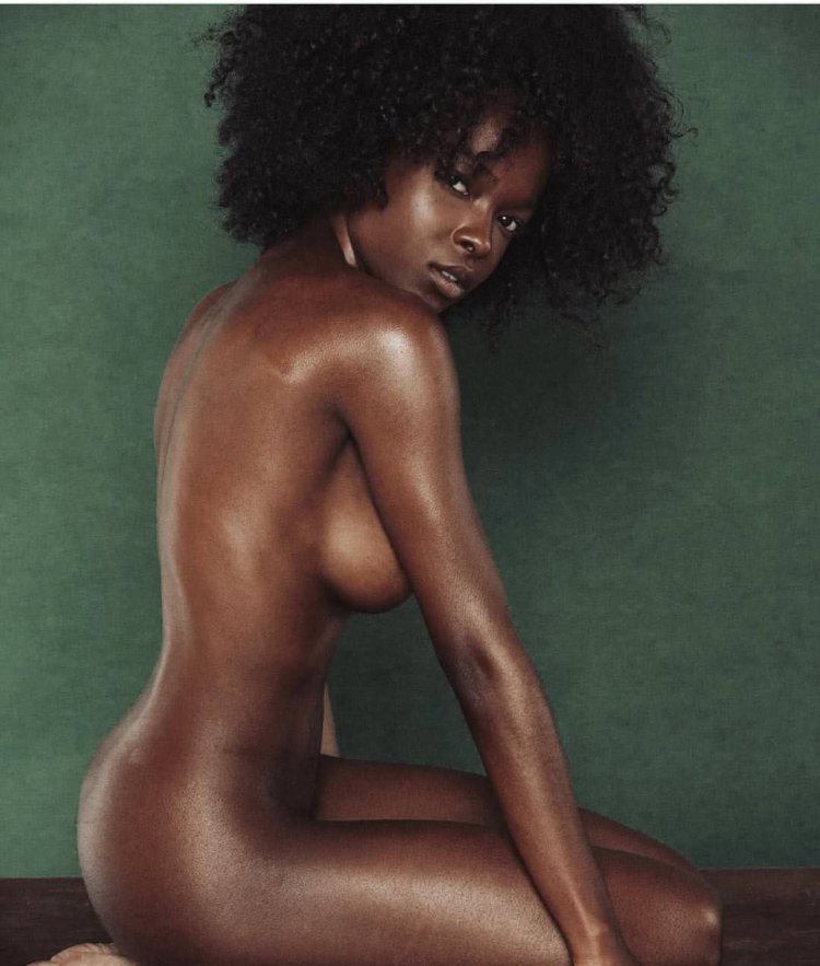 Naked mulatto with Afro haircut