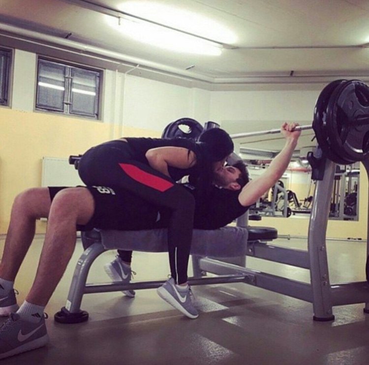 Brunette in the gym from the back