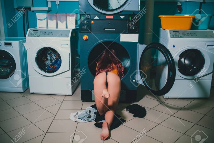 Homemade nude in panties washing machine