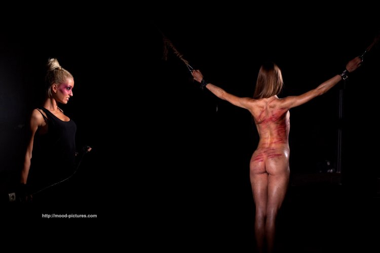 Proceeding girls with a whip on the back