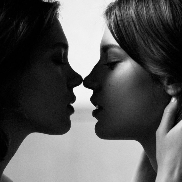 Kiss two girls
