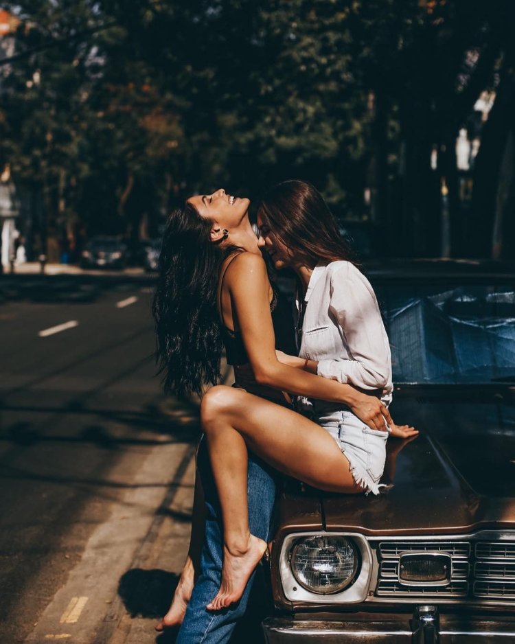 Lesbian couple in a car