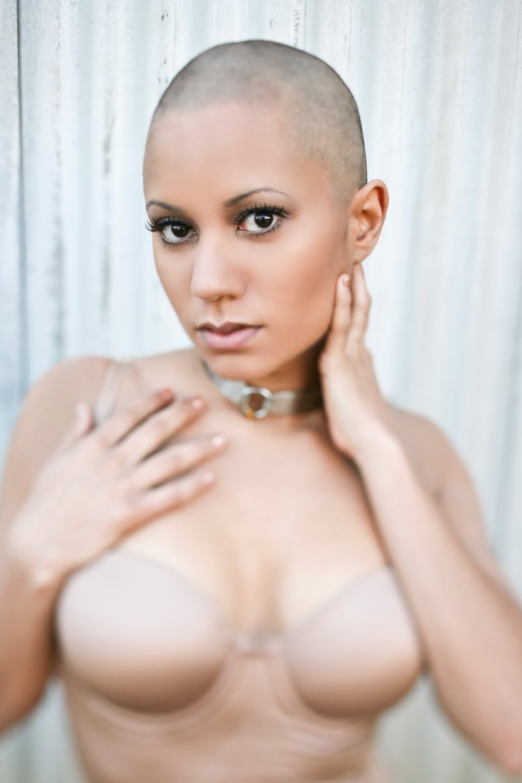 Busty bald woman